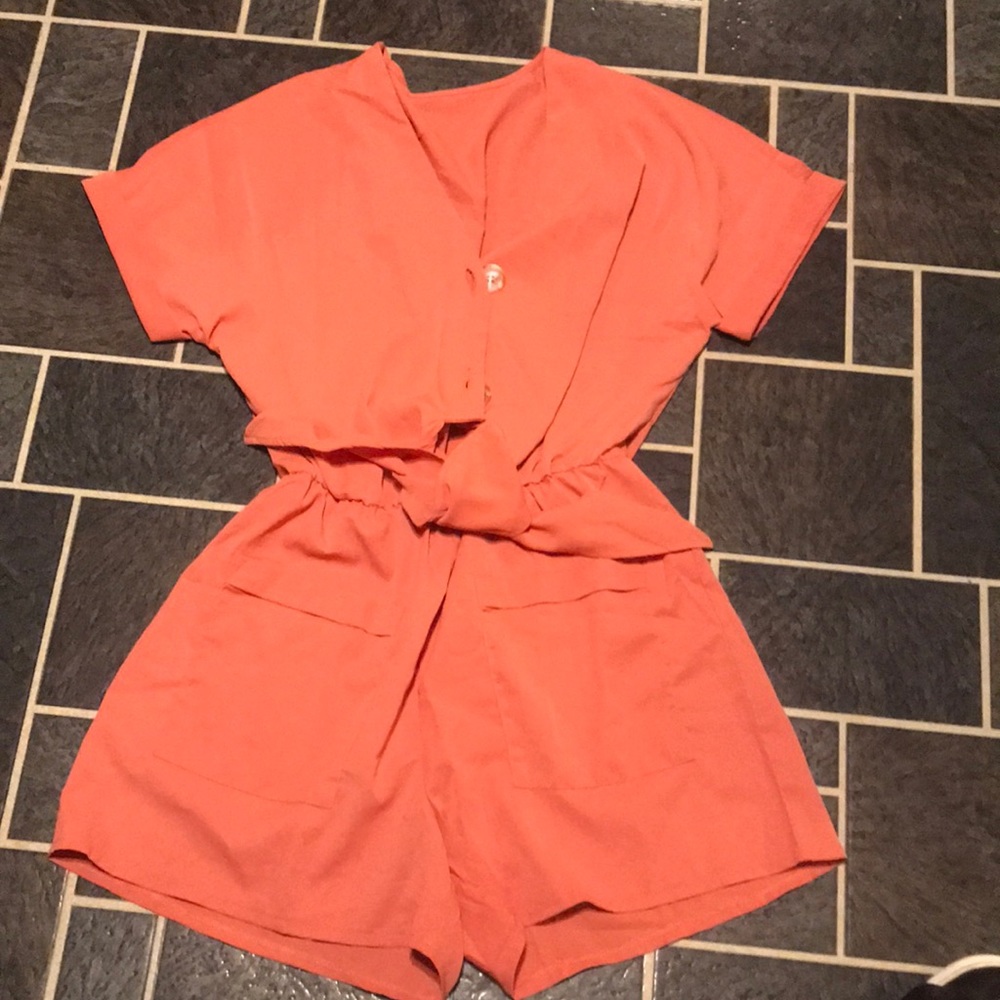 Super cute shorts romper.